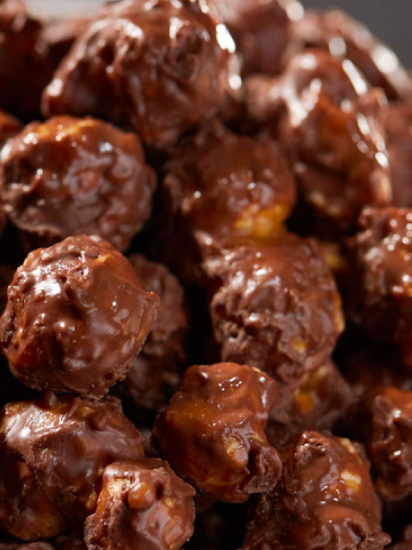 Chocolate covered popcorn in a bowl